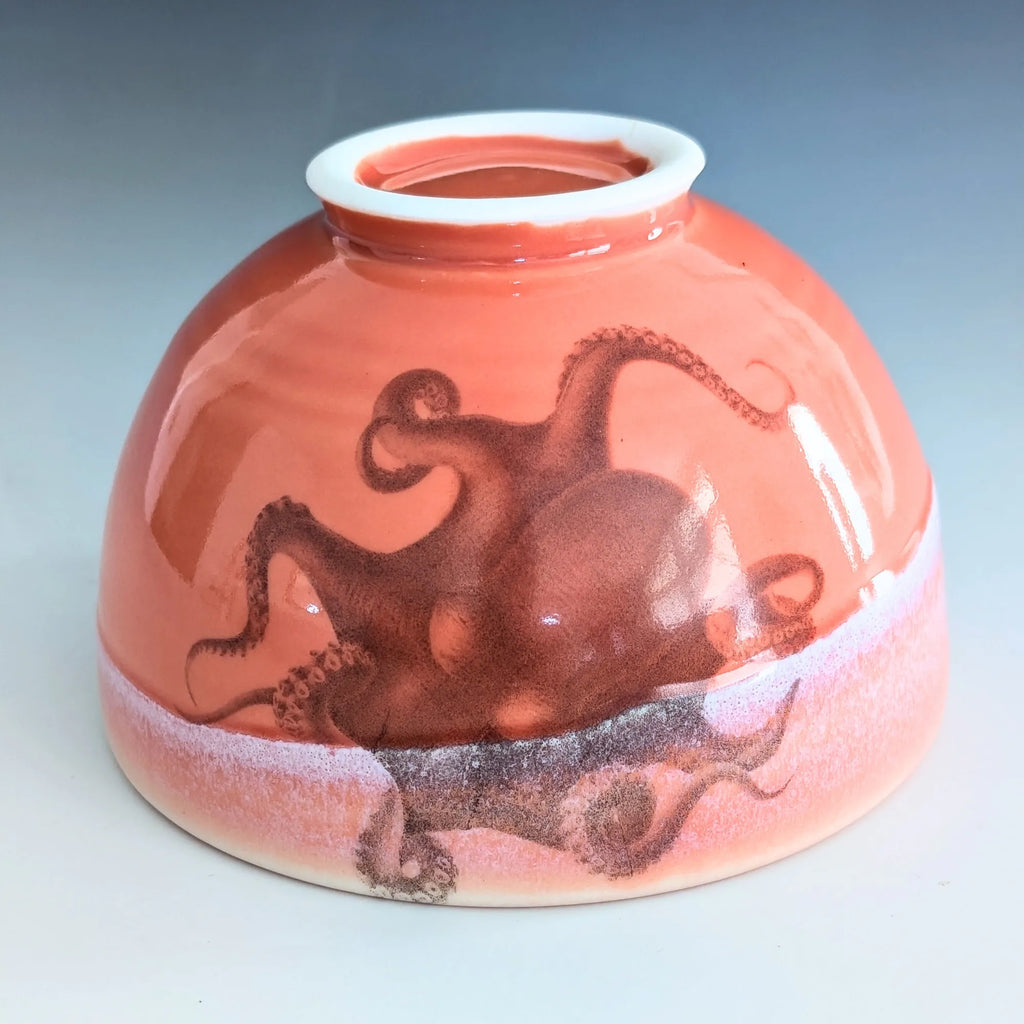 Ceramic bowl with octopus design on a gradient background